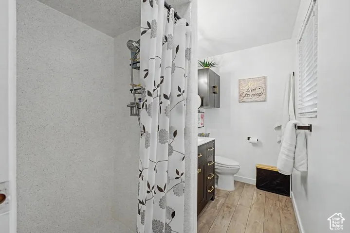 Primary ensuite bathroom has an updated tile surround in the shower