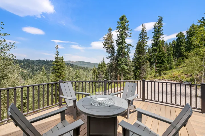 Wood-finish deck with a dark railing system