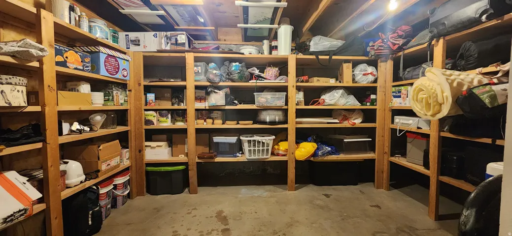 Extensive built-in wood shelving for organized storage