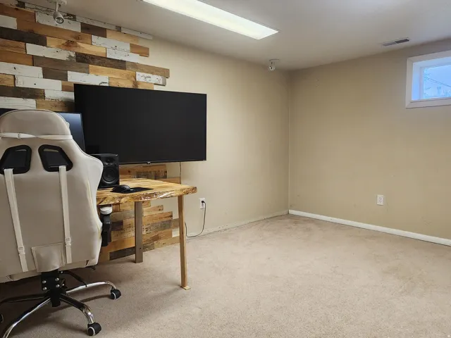 Accent wall with reclaimed wood paneling