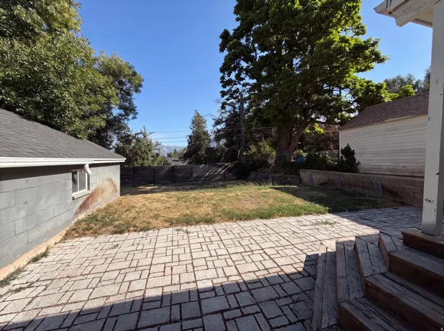 Paved patio area featuring interlocking pavers
