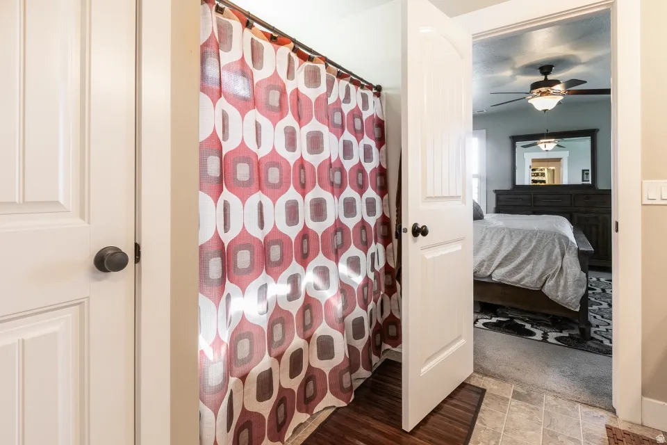 White paneled door with black hardware