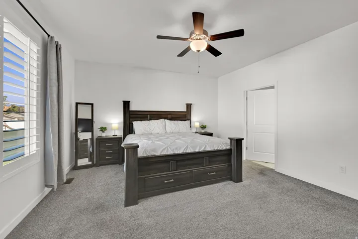 Light gray carpeting with a white paneled door