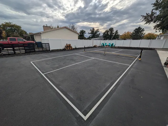 Dedicated recreational court with professional-grade markings and durable asphalt surface