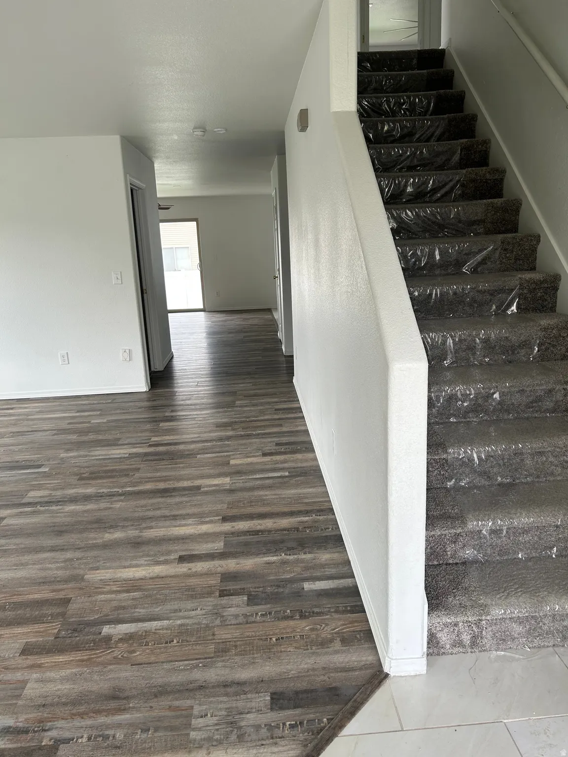 Wood-finish flooring throughout the main level