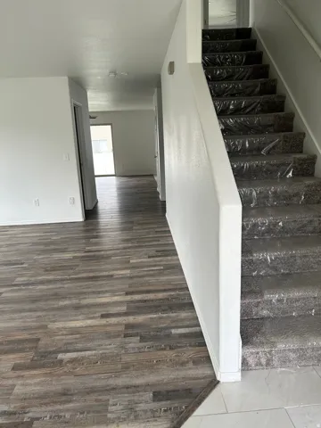 Wood-finish flooring throughout the main level