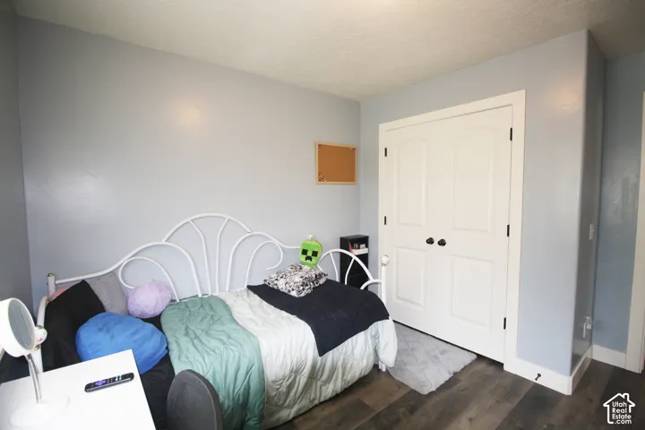 Wood-finish flooring, light blue wall paint, and white trim