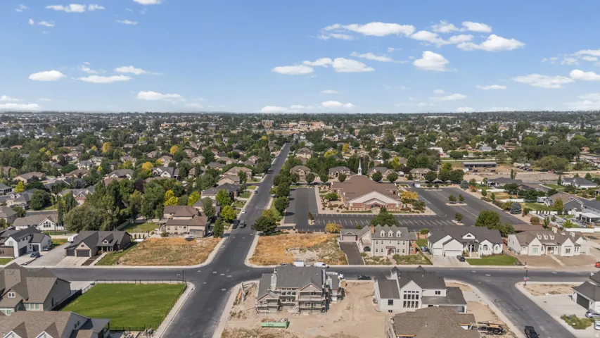 Residential neighborhood featuring tree-lined streets, established homes, and new construction