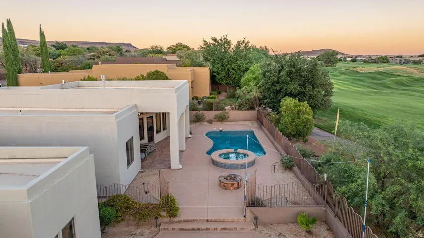 Southwestern-style exterior with stucco finish and flat roof