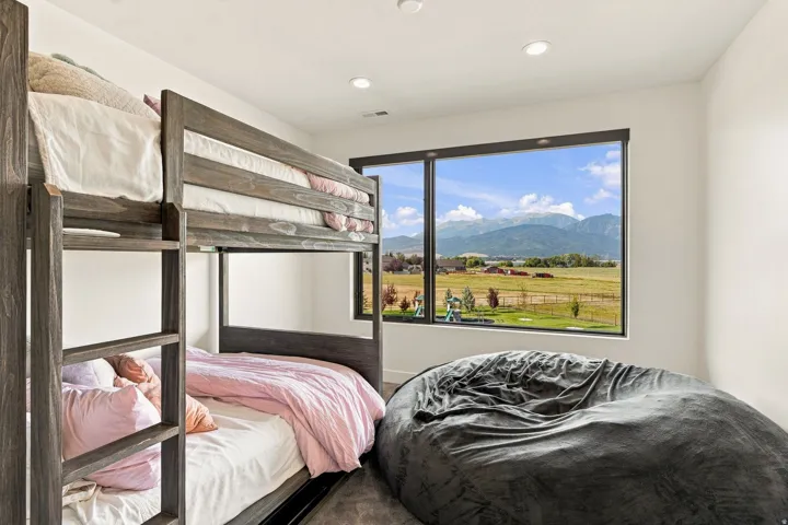 Large picture window offering mountain scenery