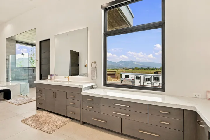 Double vanity with an integrated sink and white countertop
