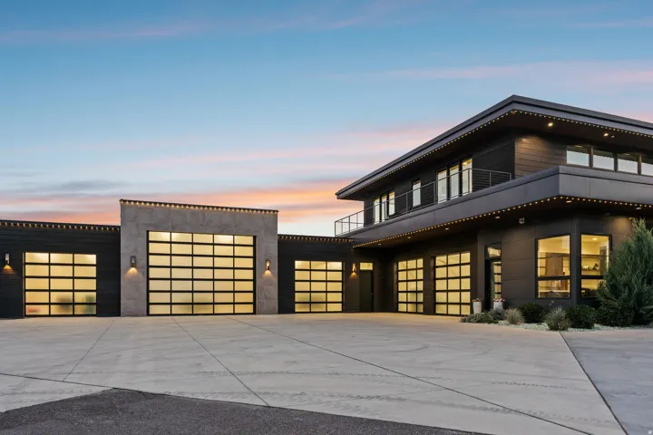 Modern exterior architecture featuring dark siding and a flat roofline