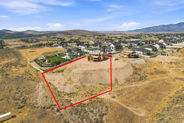 Back of house with walkout basement & covered deck & large yard. Yard boundaries drawn are approximate