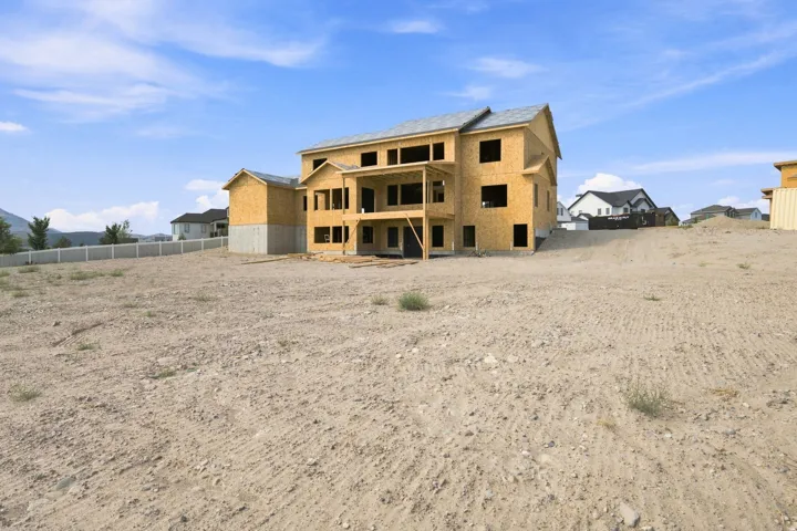 Back of house with walkout basement & covered deck - large yard