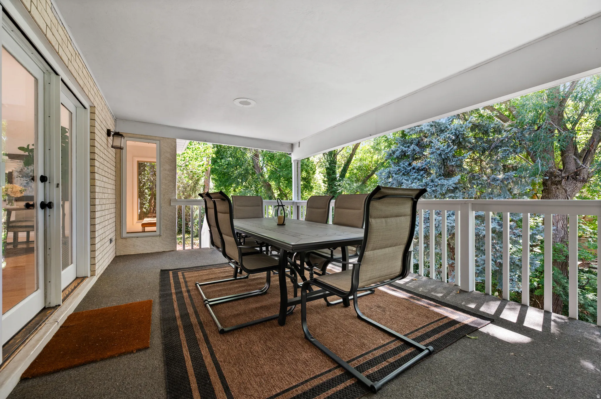 Dine outdoors beneath the tree canopy with the sights and sounds of the creekside setting all around you.