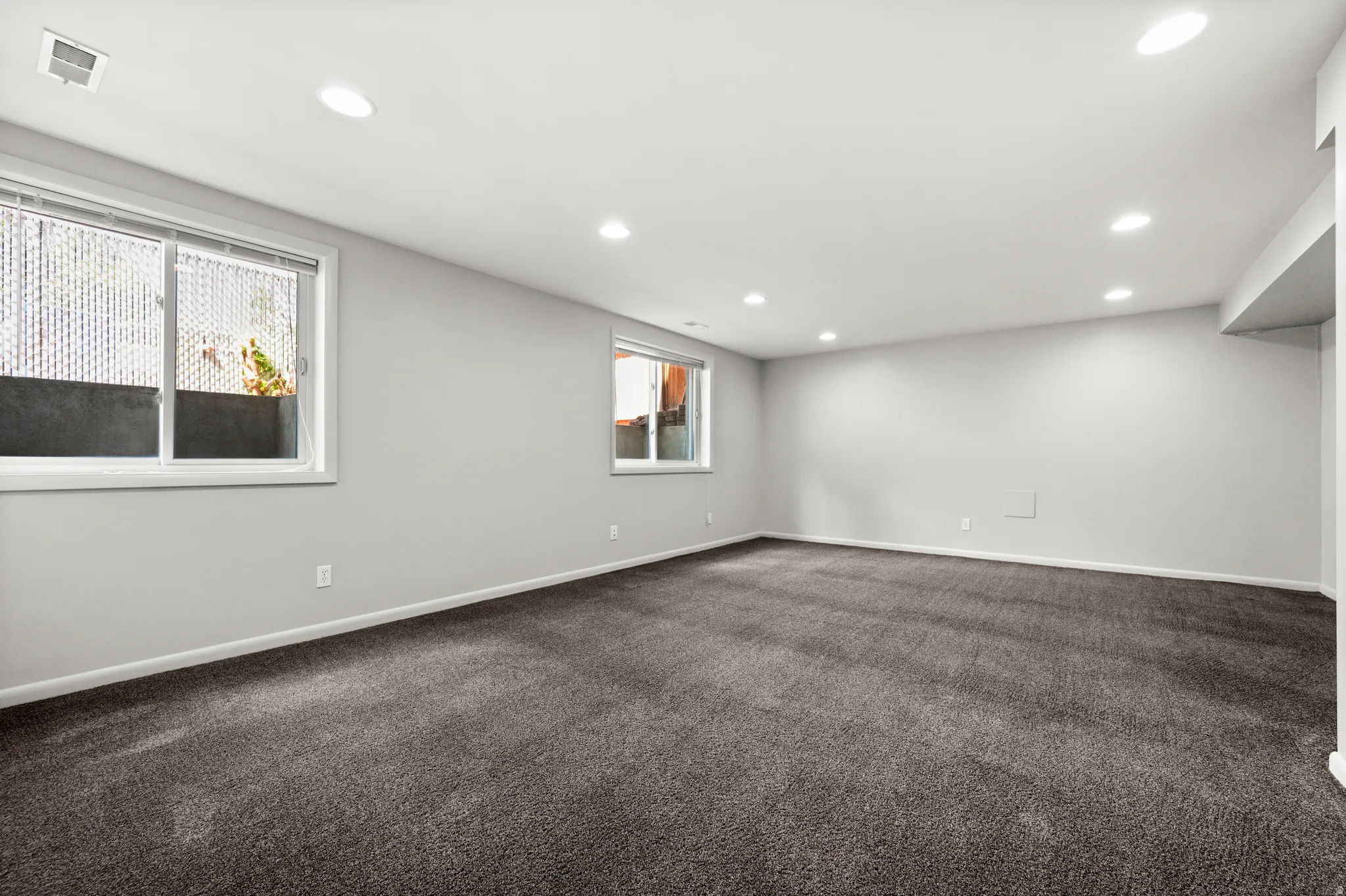 Generous lower-level space offers flexibility for recreation, guests, work or everyday living.