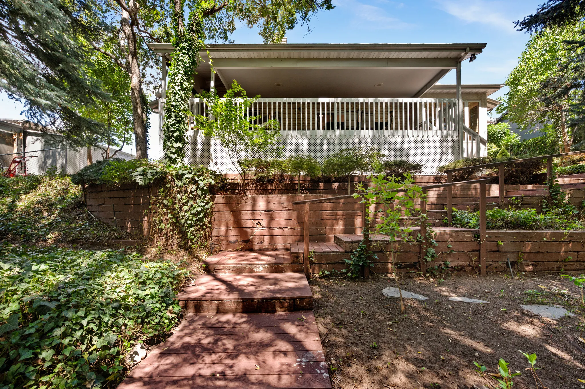 Terraced outdoor spaces create places to gather, relax and enjoy the natural surroundings.