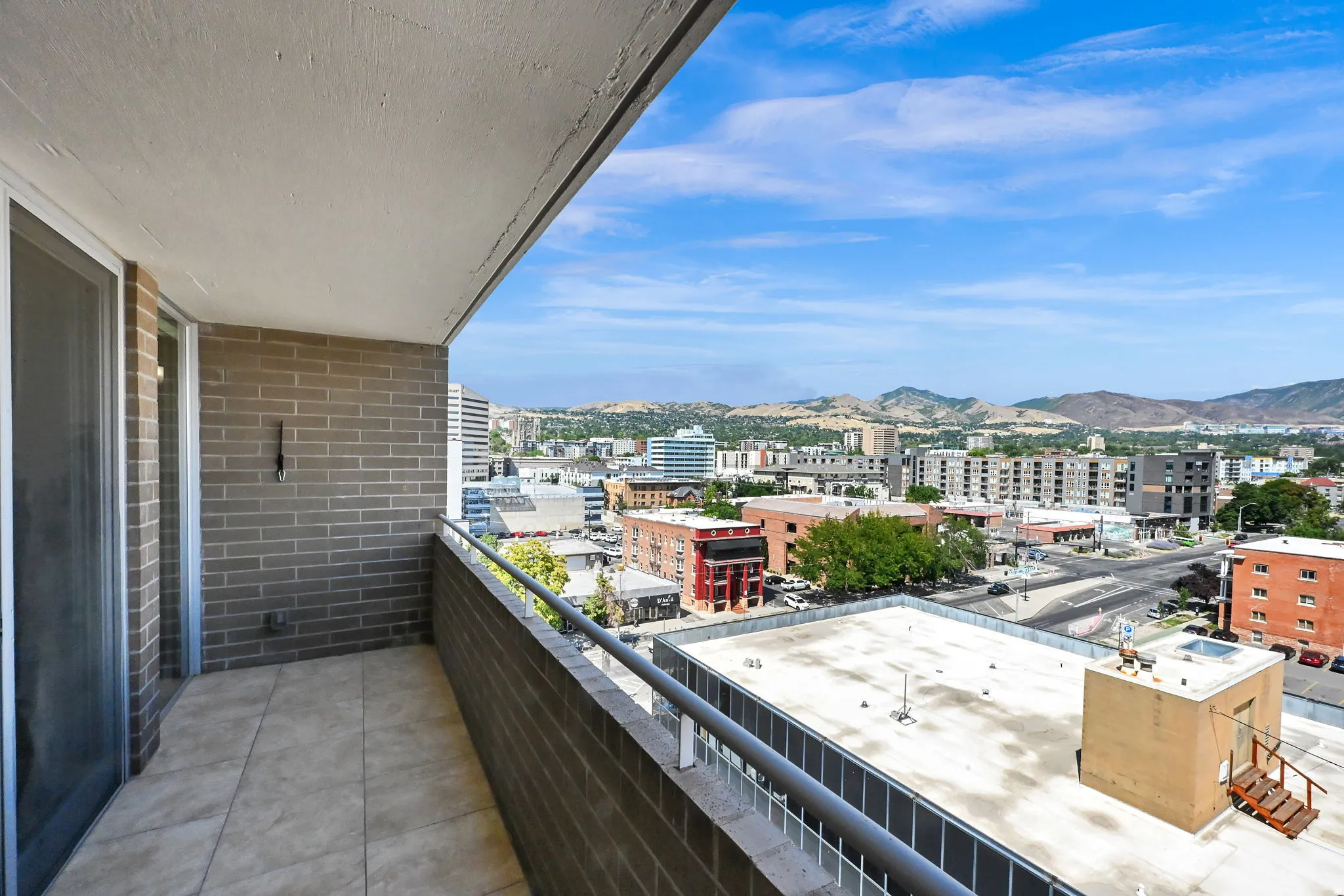 Private balcony with city and mountain views
