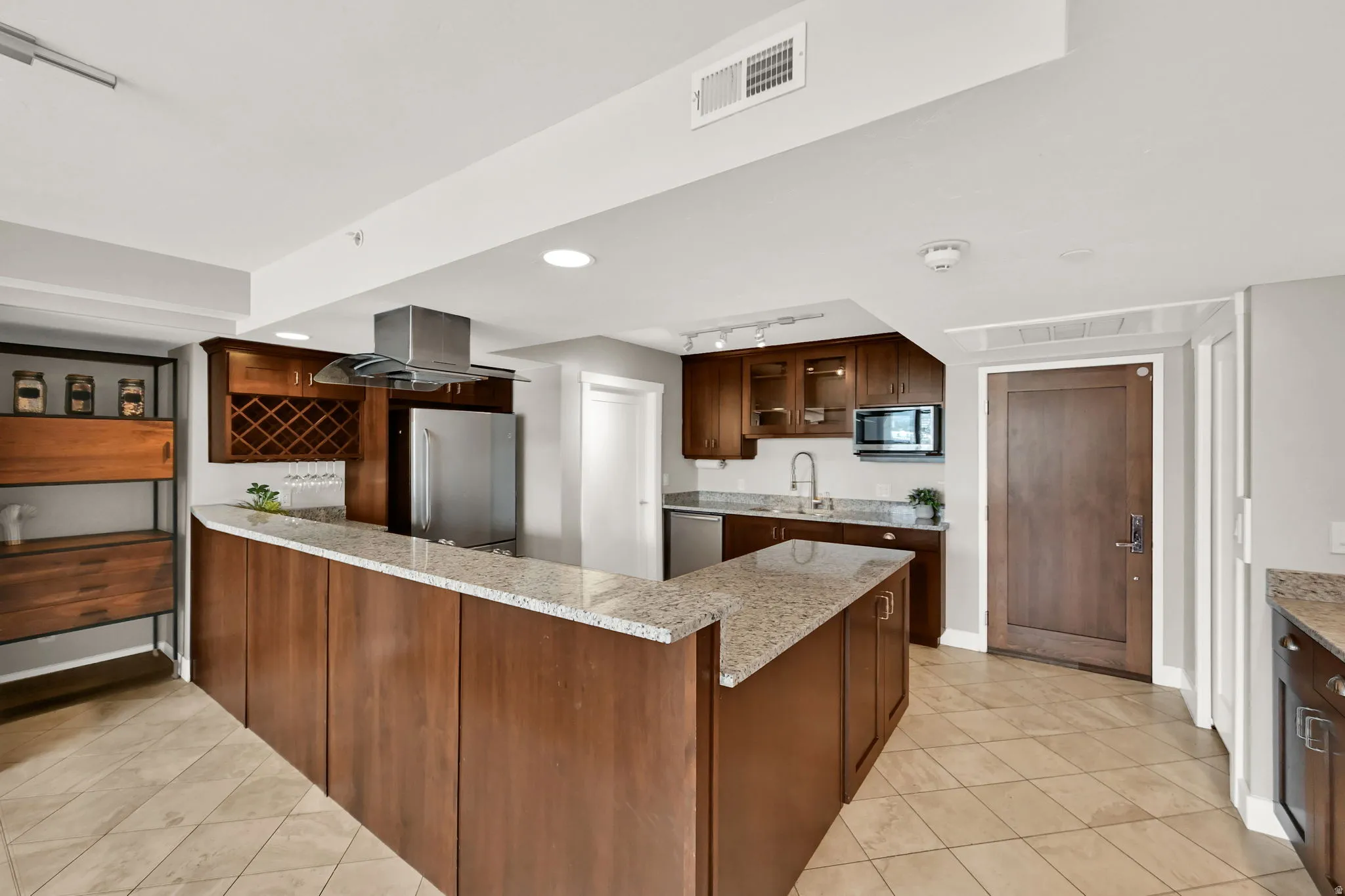 Large kitchen and entrywall.
