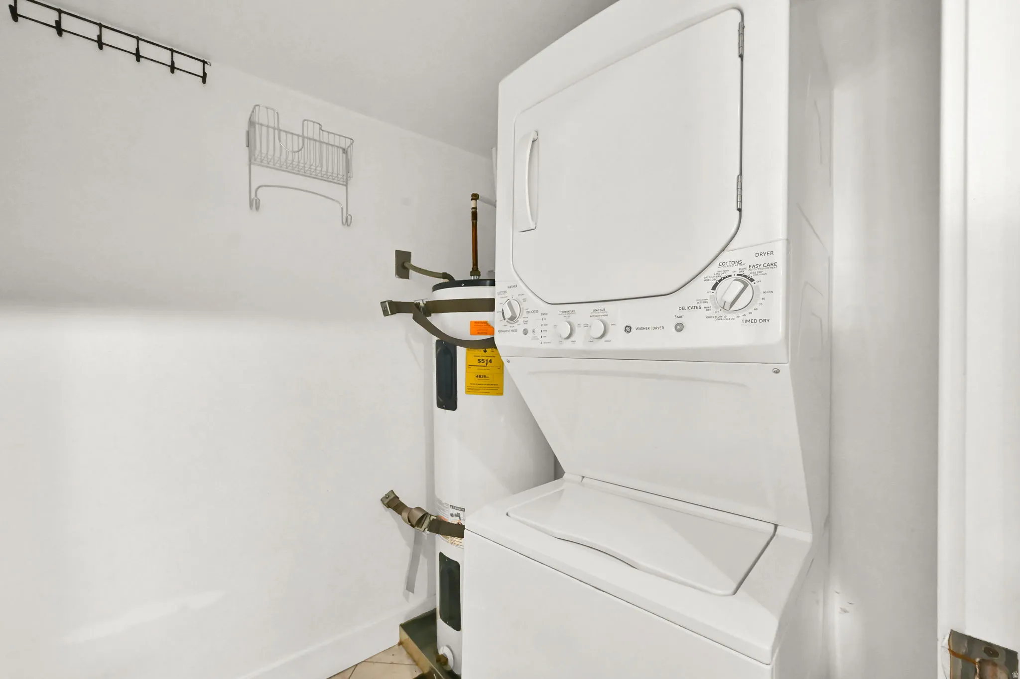 Stackable washer and dryer unit, water heater and pantry