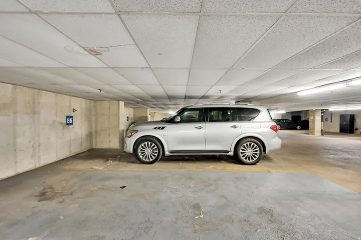 Extra long parking space with room for storage closet, motorcycle or bicycles.