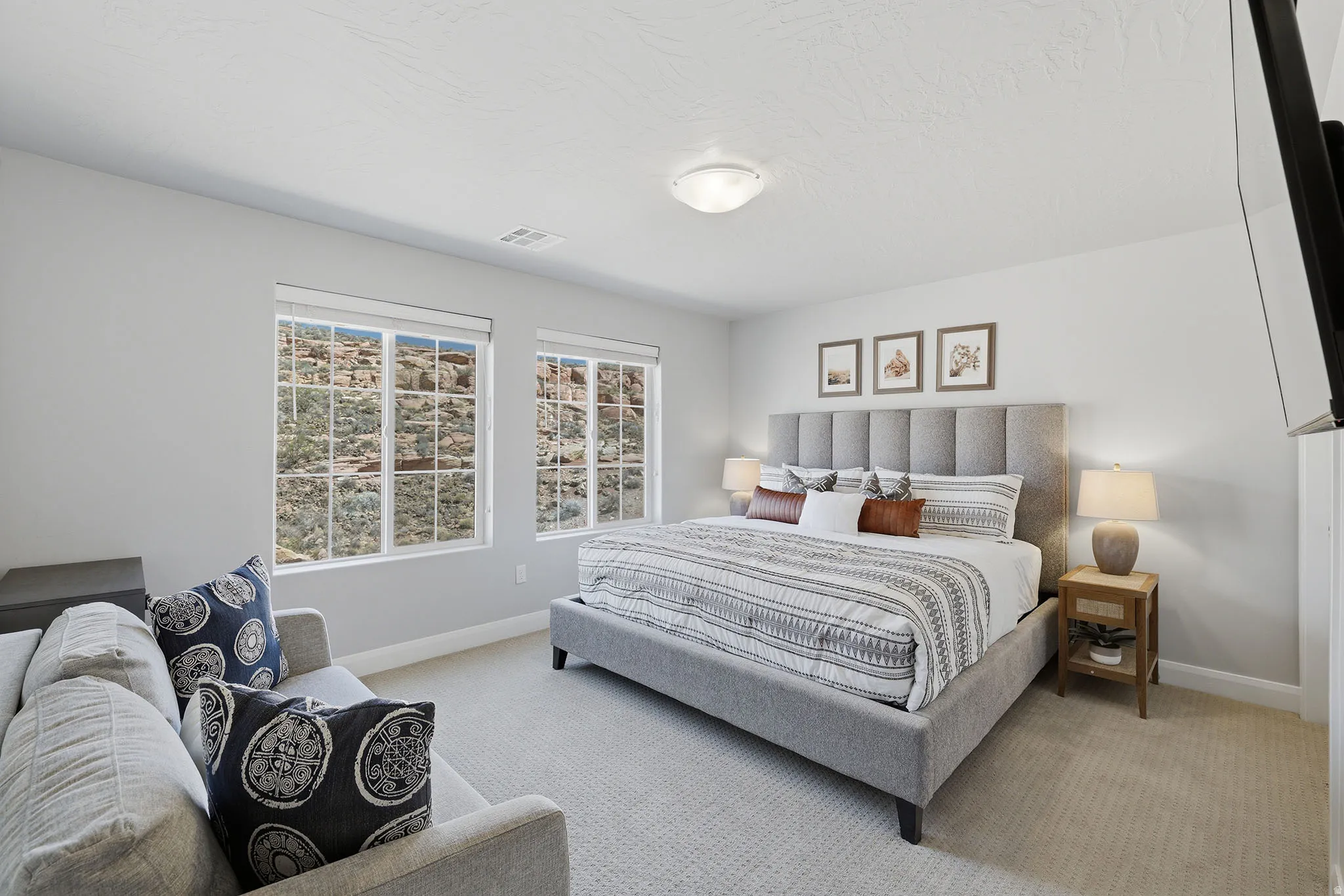 Neutral-toned carpeting paired with light grey walls