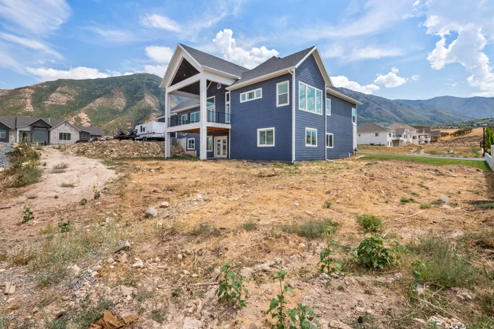 Blue siding exterior with white trim