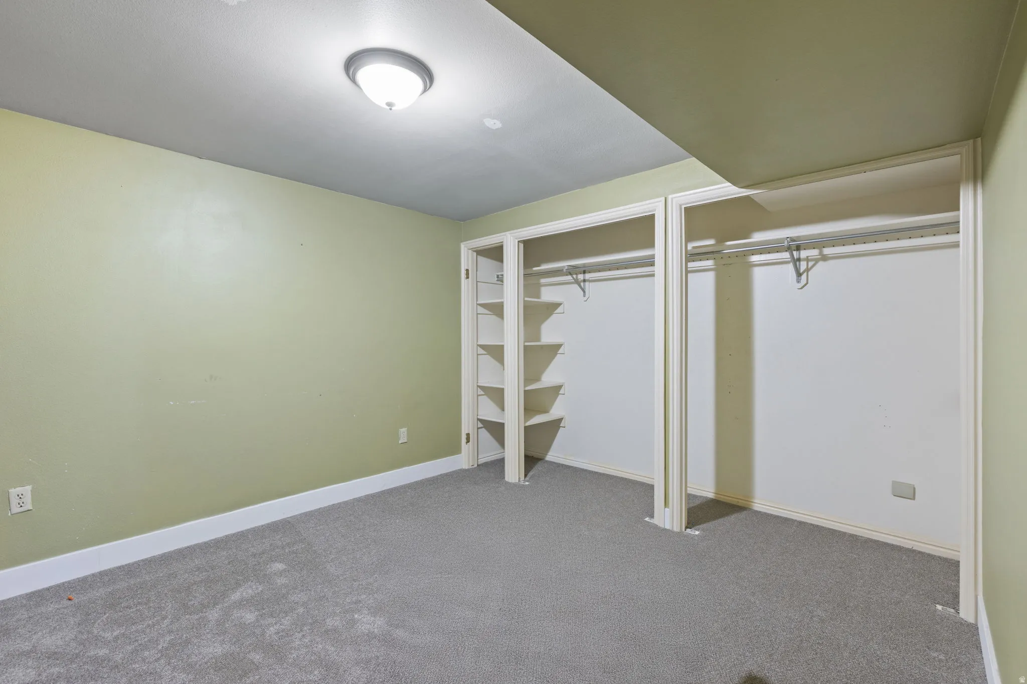Wall-to-wall carpeting and neutral wall tones