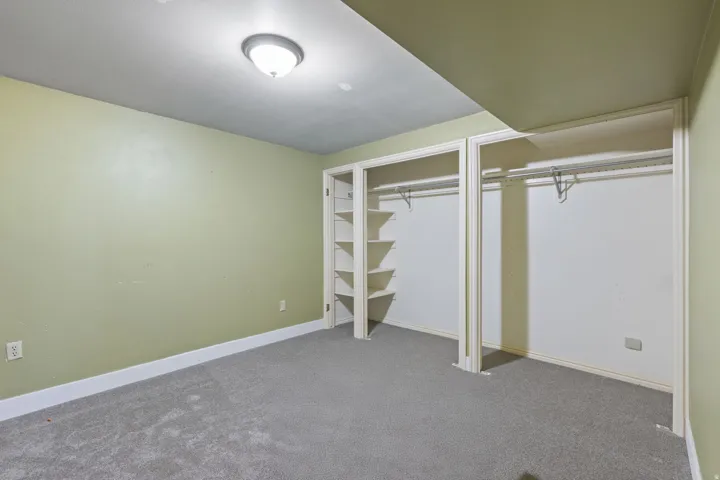 Wall-to-wall carpeting and neutral wall tones