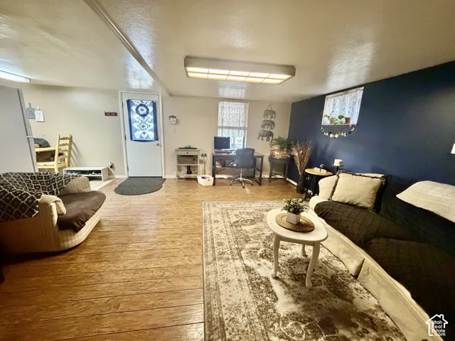 Wood-finish flooring throughout the space