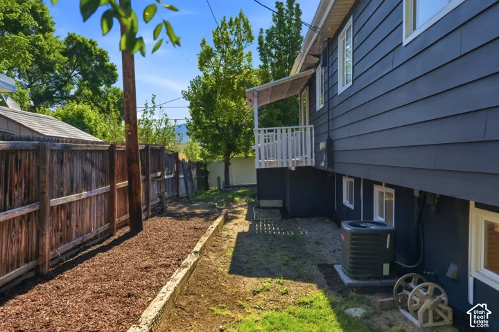 Dark gray exterior siding with white trim
