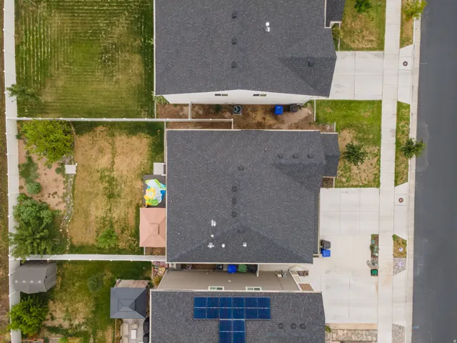 Additional contentThe aerial perspective does not provide sufficient detail of specific architectural features, finishes, or permanent fixtures to craft a compliant, factual caption