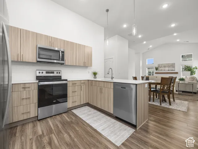 Kitchen with stainless steel appliances and quartz counters. *Fridge not included*