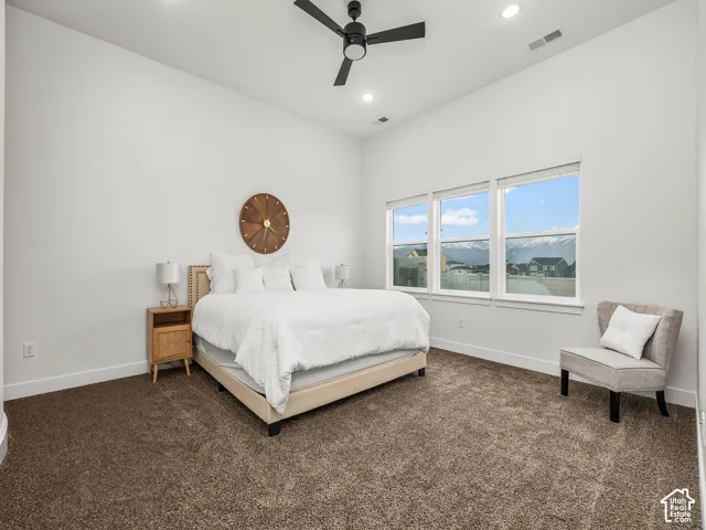 Primary bedroom with private en suite and walk in closet.