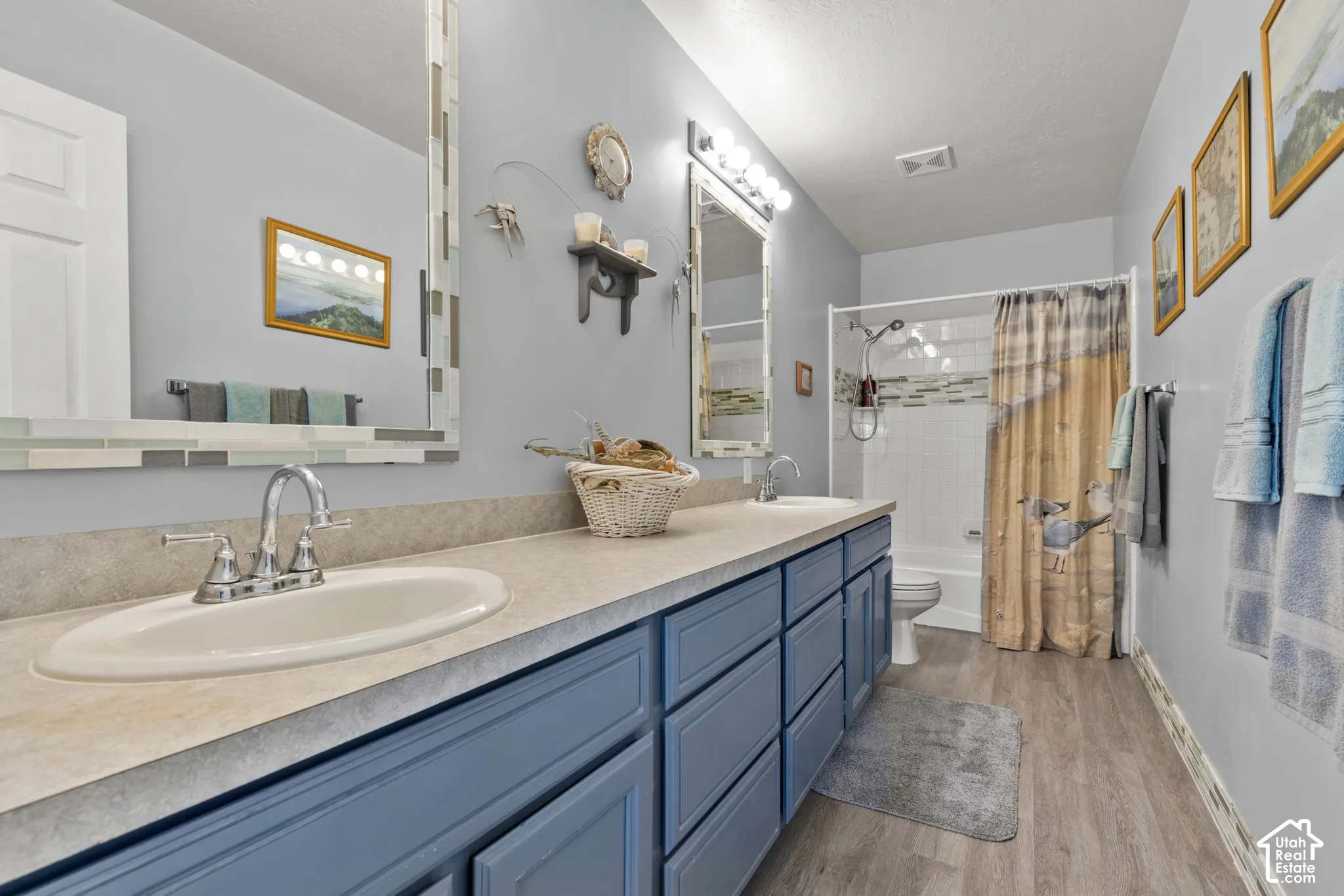 Dual vanity with integrated sinks and chrome fixtures