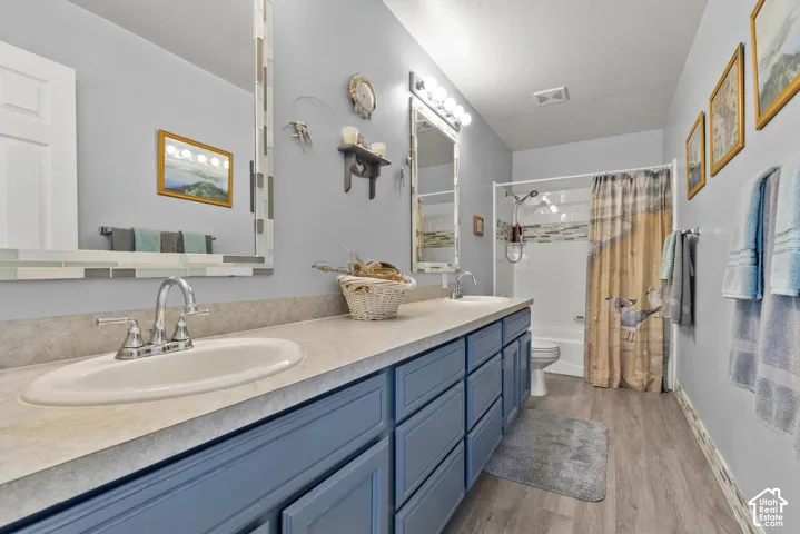 Dual vanity with integrated sinks and chrome fixtures