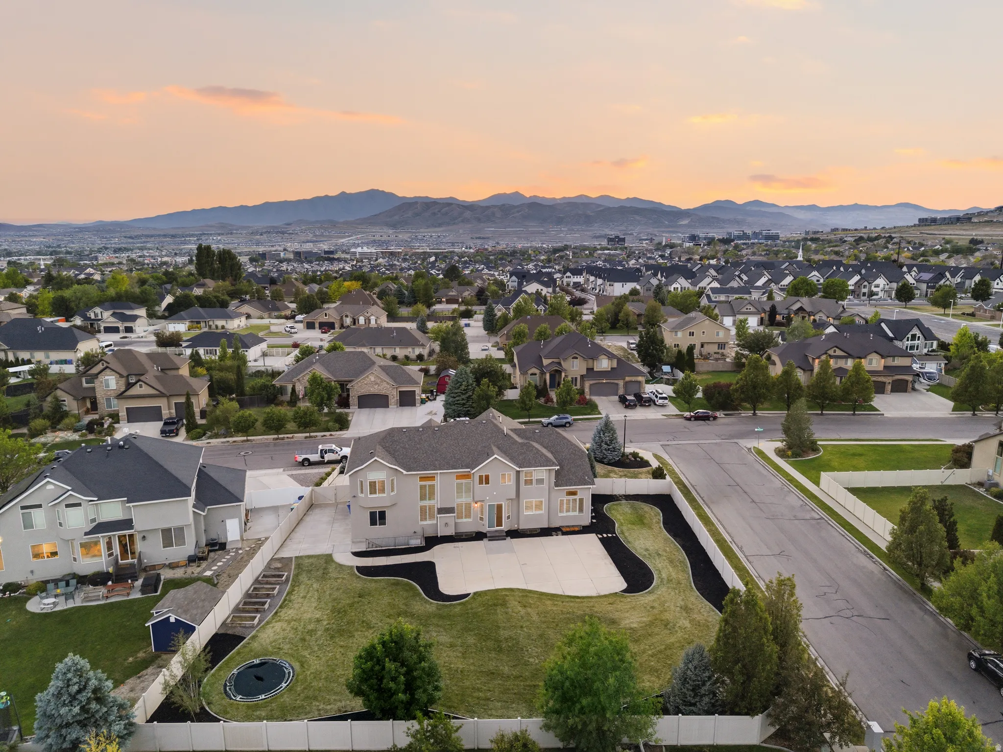 Expansive residential setting with mountain backdrop