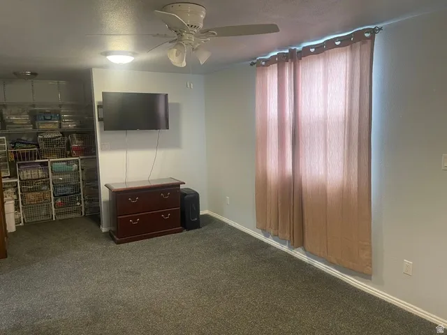 Recessed lighting and ceiling fan overhead