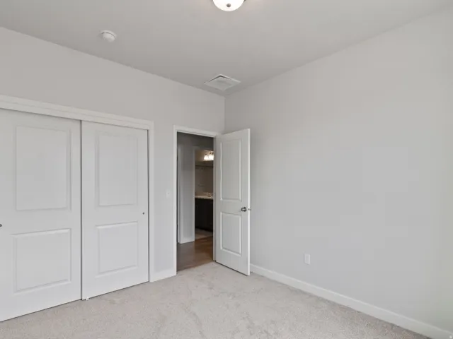 Light-toned wall paint with a white trim