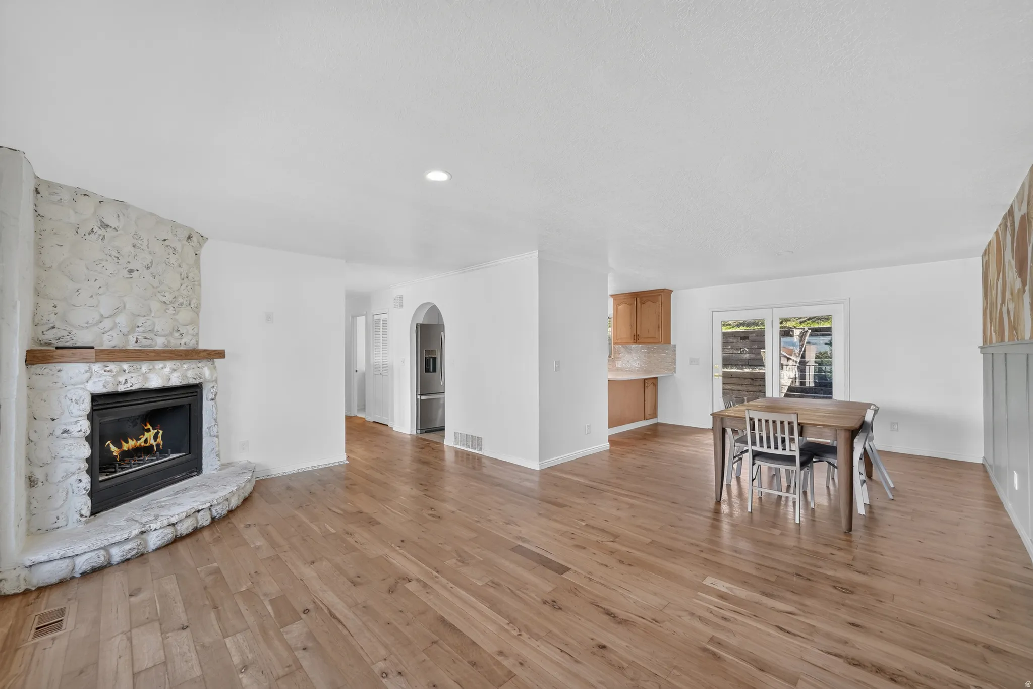 Upstairs living area featuring gas fireplace.