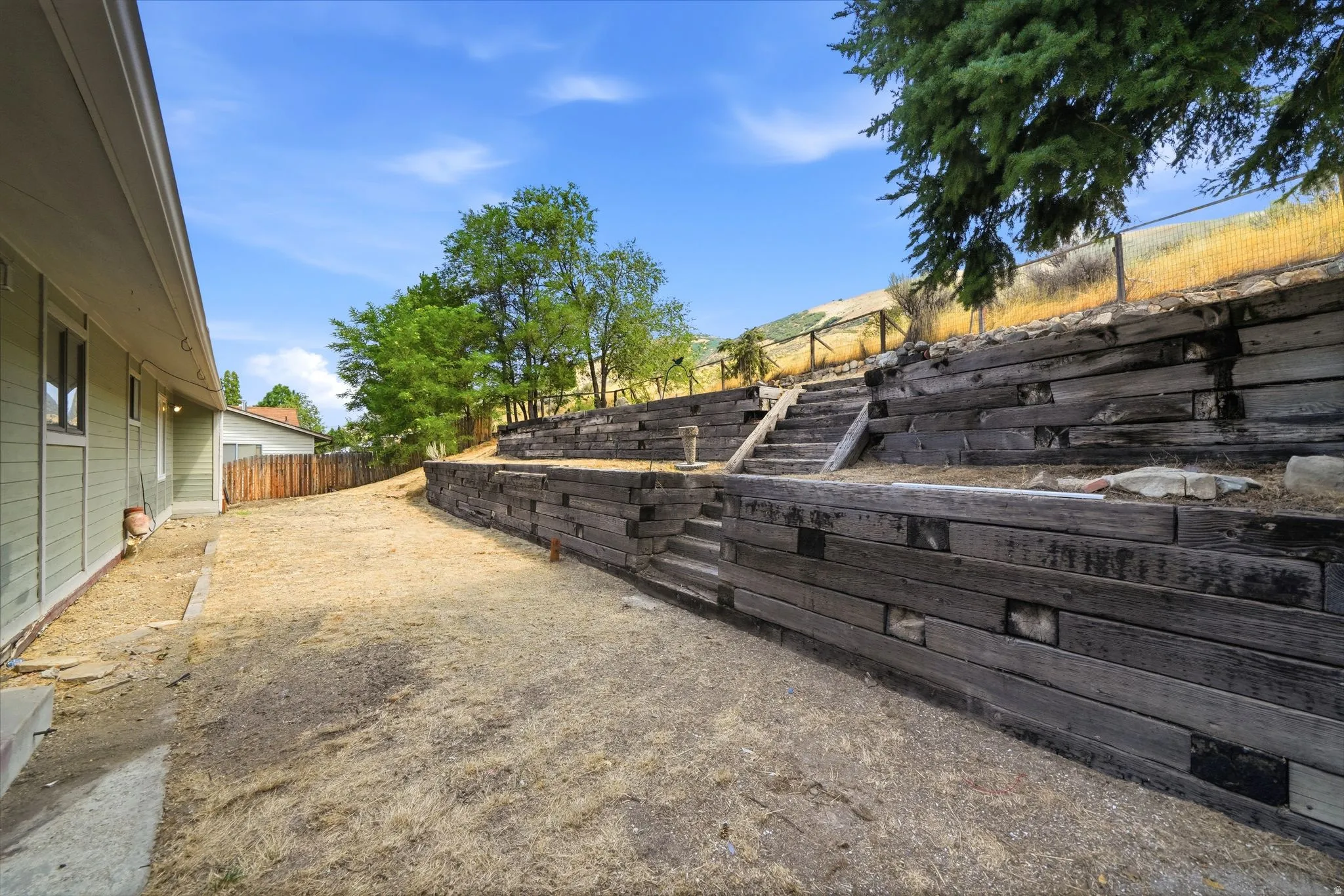 3 tier backyard up to foothills. No backyard neighbors to ensure added privacy.