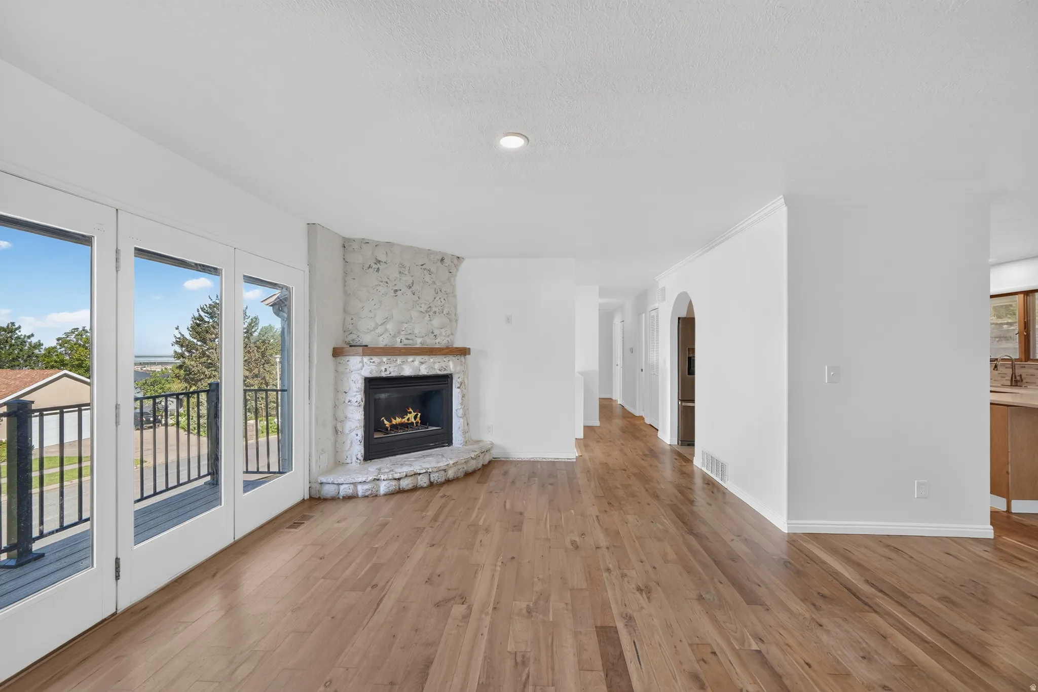 Upstairs living area featuring gas fireplace.