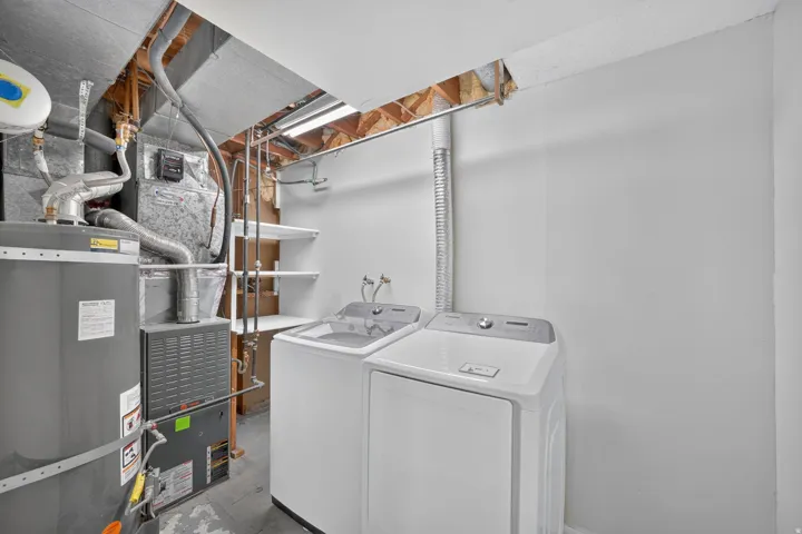 Laundry and utility area. Washer and Dryer included.