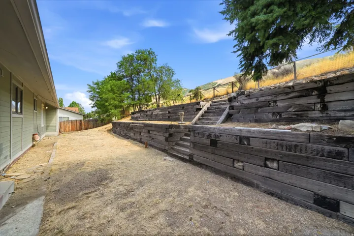 3 tier backyard up to foothills. No backyard neighbors to ensure added privacy.