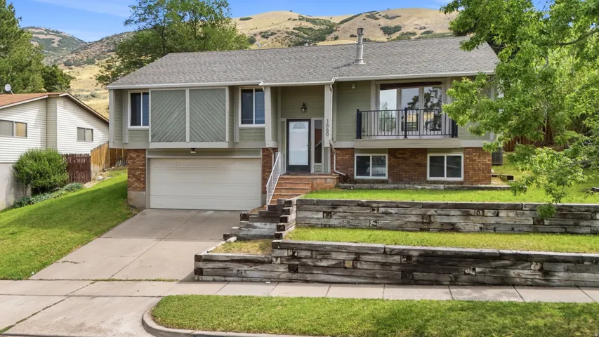 Split-level residence perched up on the foothills.