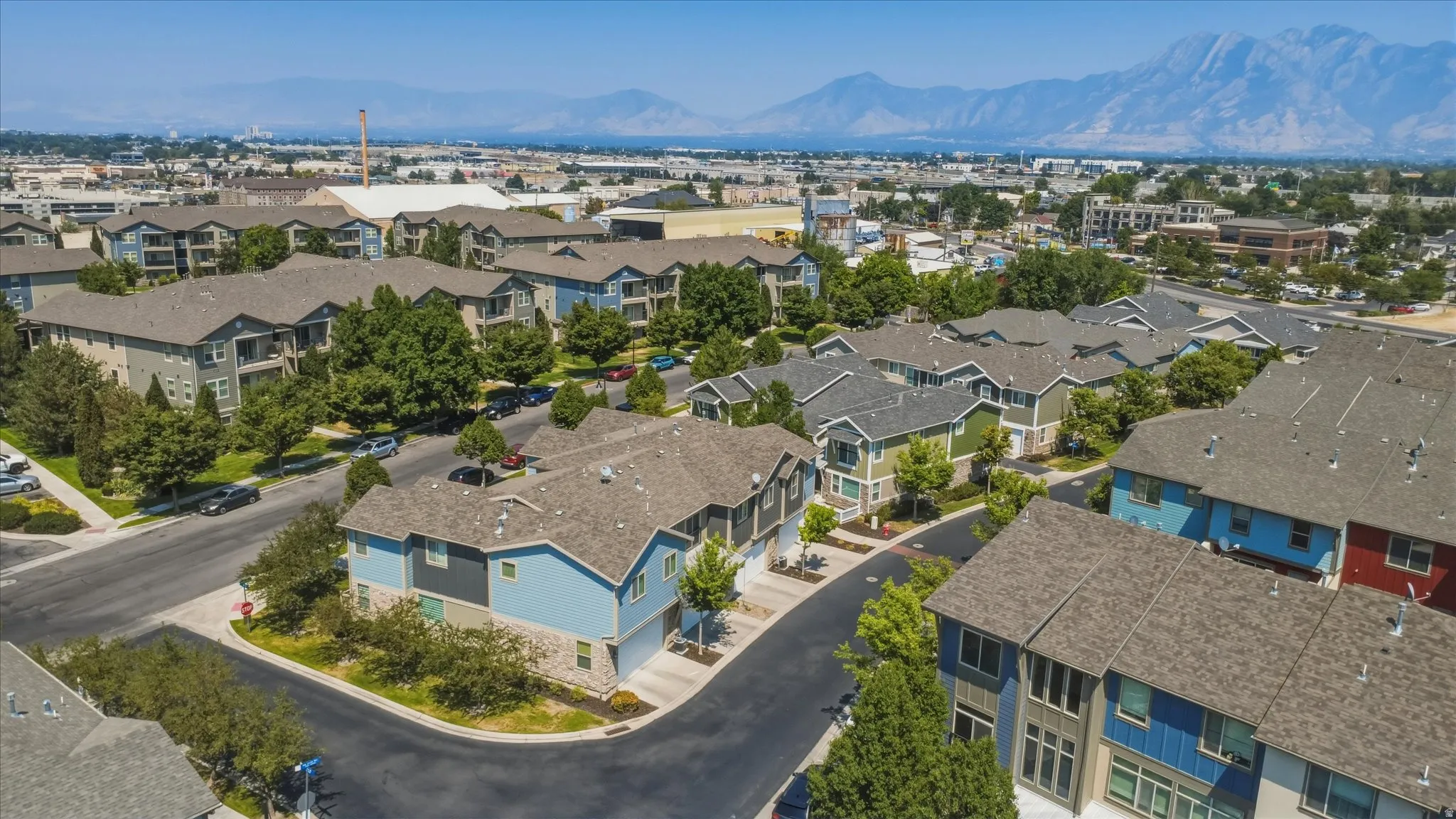 Aerial perspective of a developed residential community with varied architectural styles