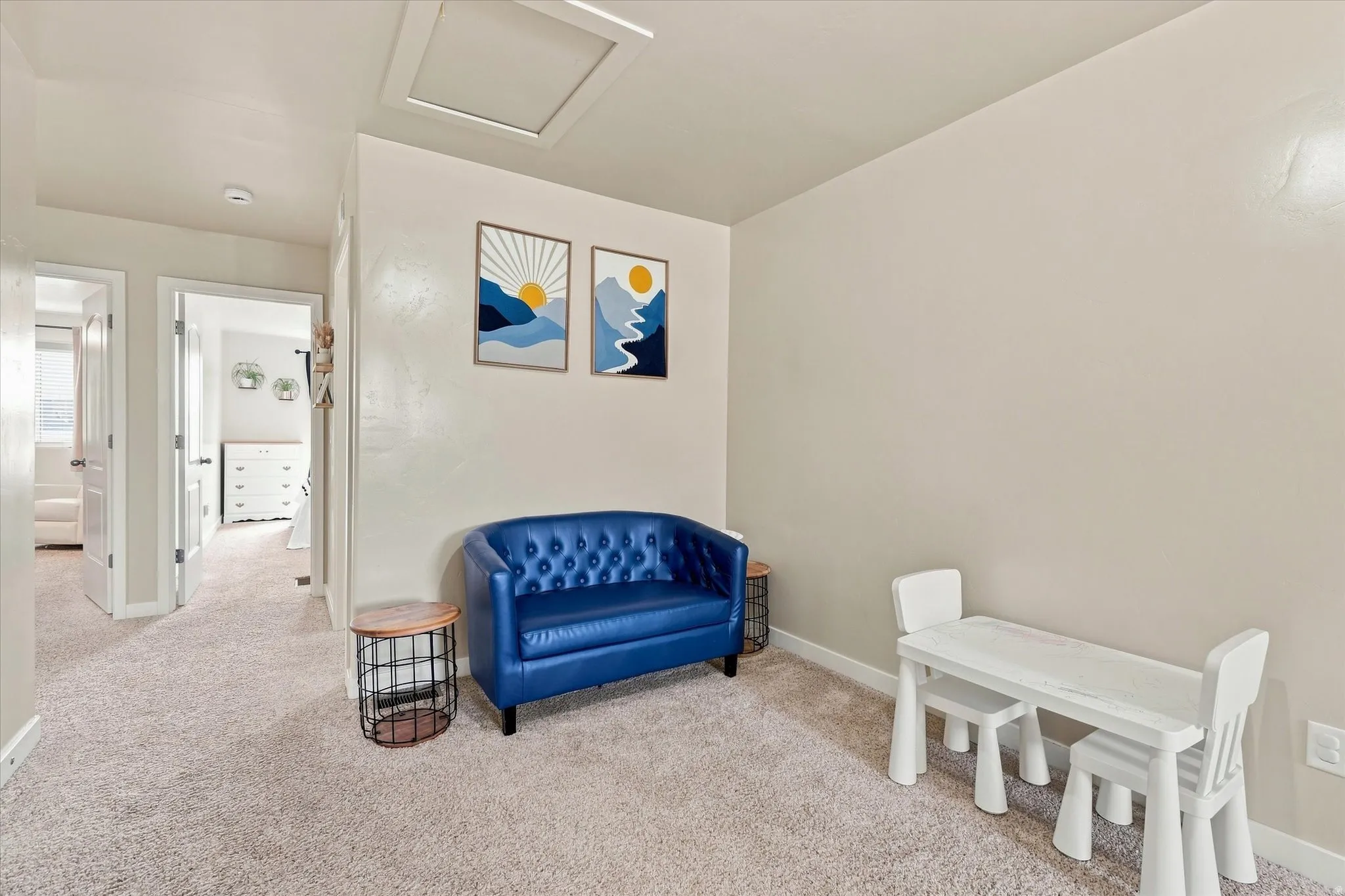 Neutral wall color, light-toned carpet flooring, recessed ceiling light, and white trim