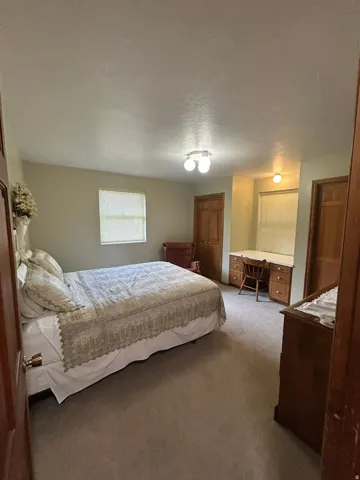Neutral-toned carpeting throughout