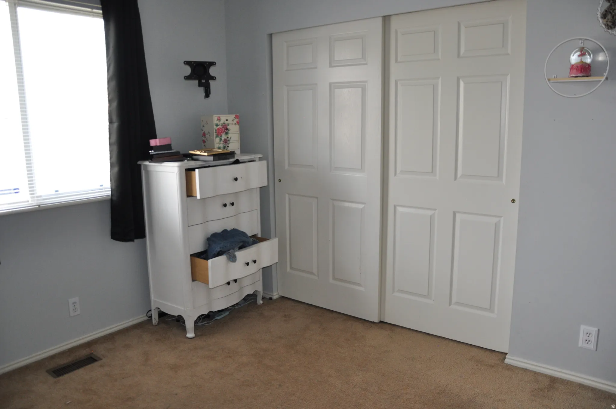 Built-in closet with paneled doors