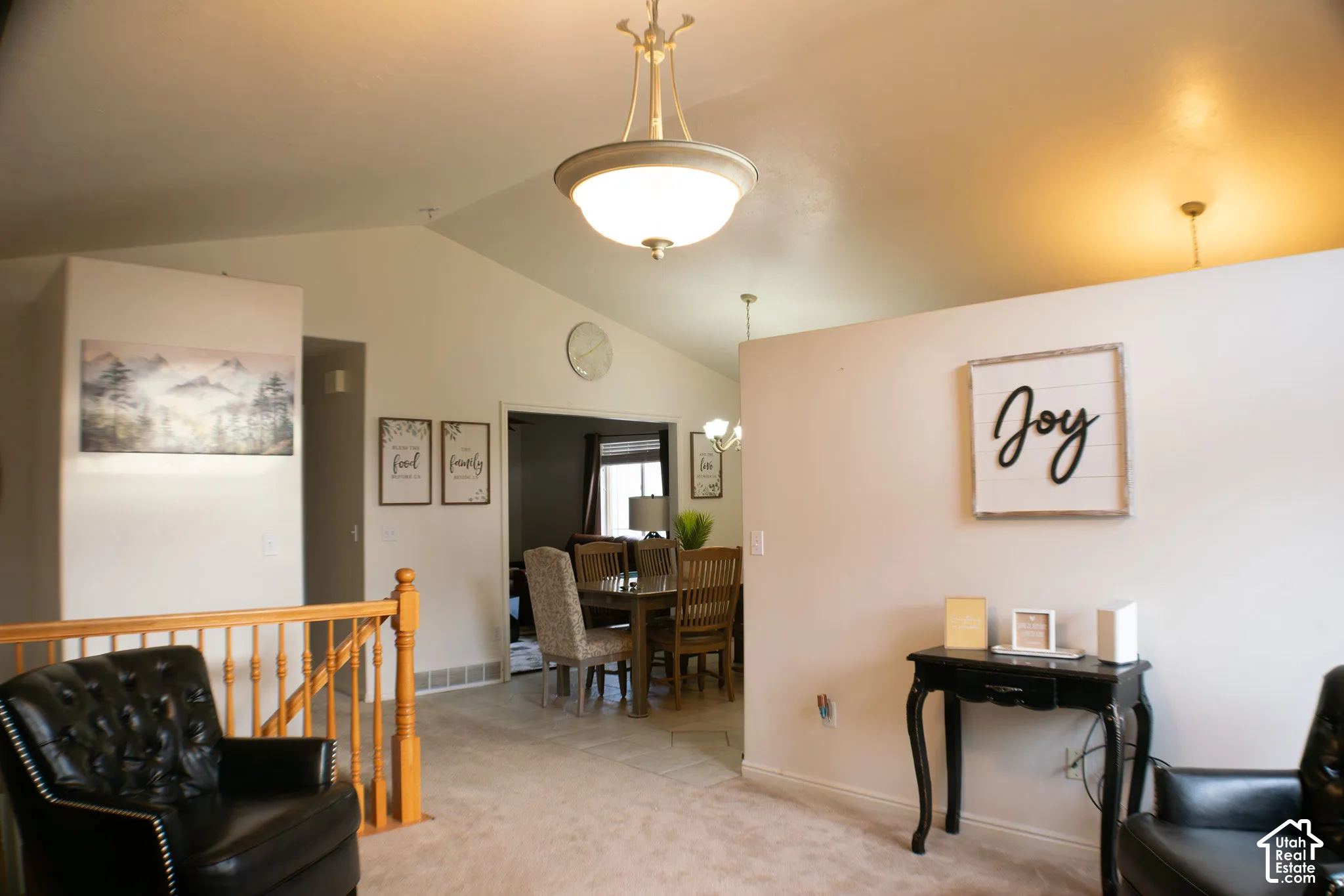 Entrance begins with this open, inviting visiting room that is large enough to be a home office, or host extra tables and chairs for larger gatherings.